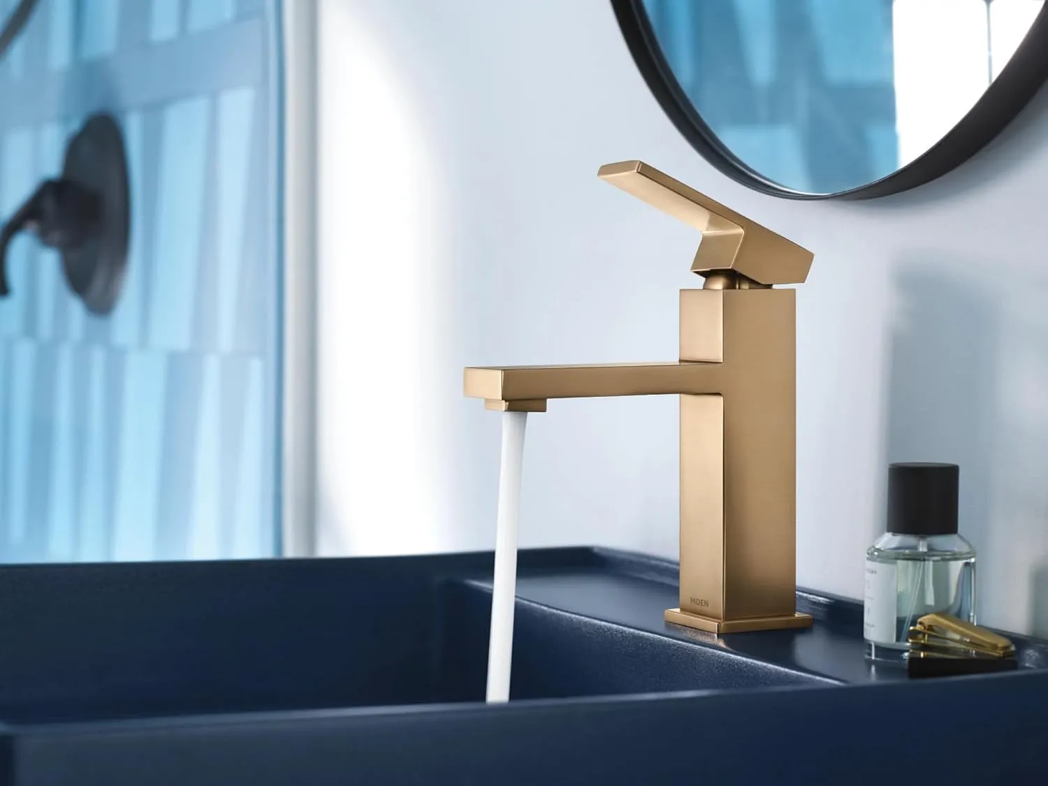 Moen Revyl Bronzed Gold One-Handle Single Hole Modern Bathroom Sink Faucet with Optional Deckplate and Spring Loaded Drain Assembly, 84771BZG